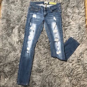 Distressed Stretch Skinny Jeans